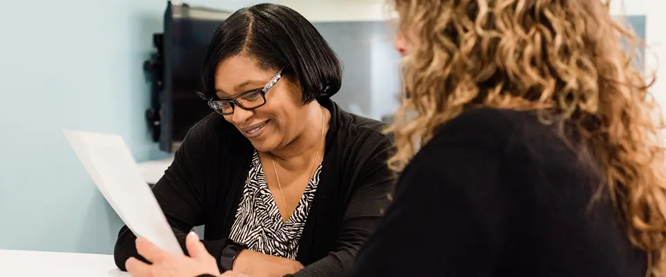 Radius Recycling customer service representative assisting a customer