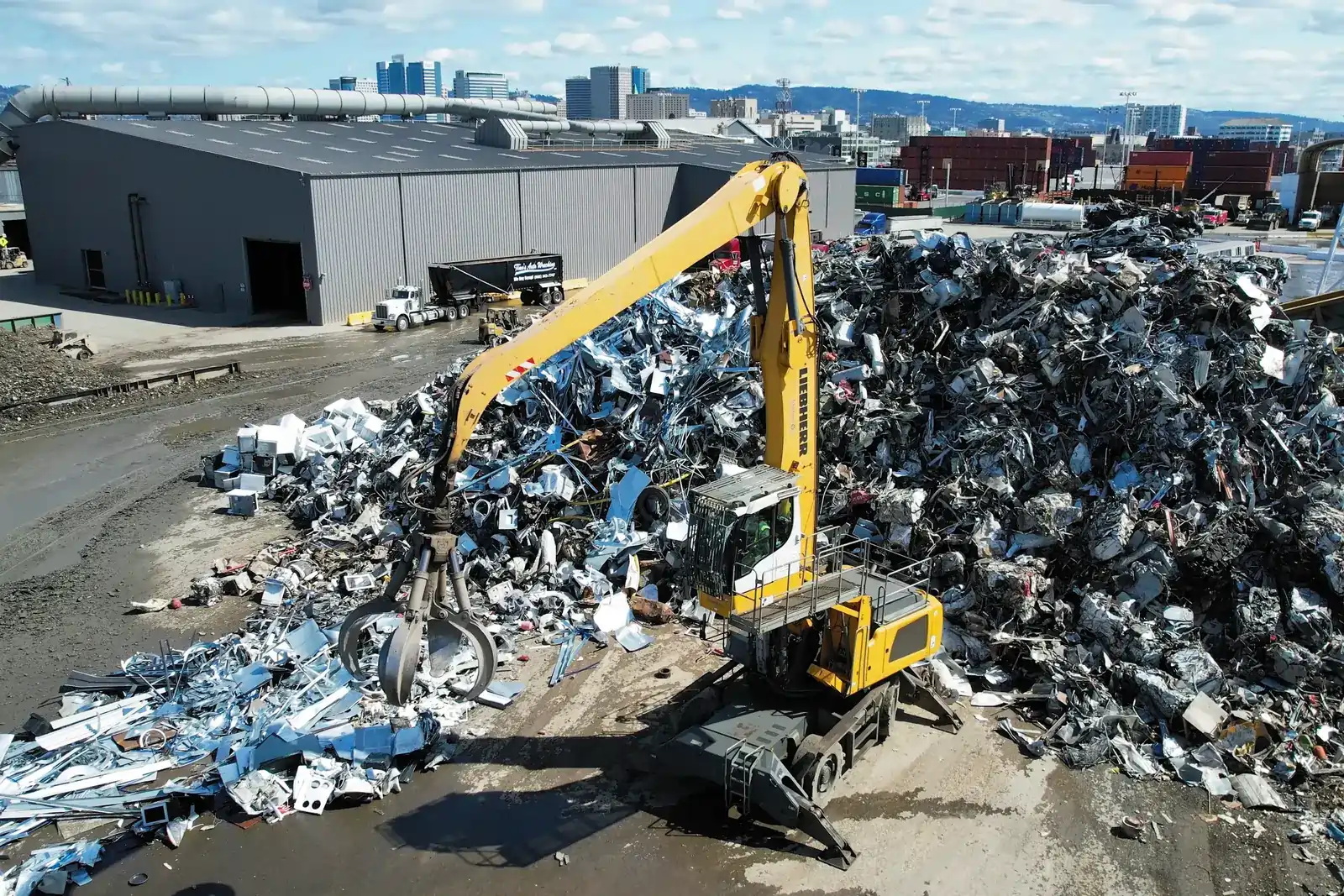 Pickup trucks dropping off household scrap metal
