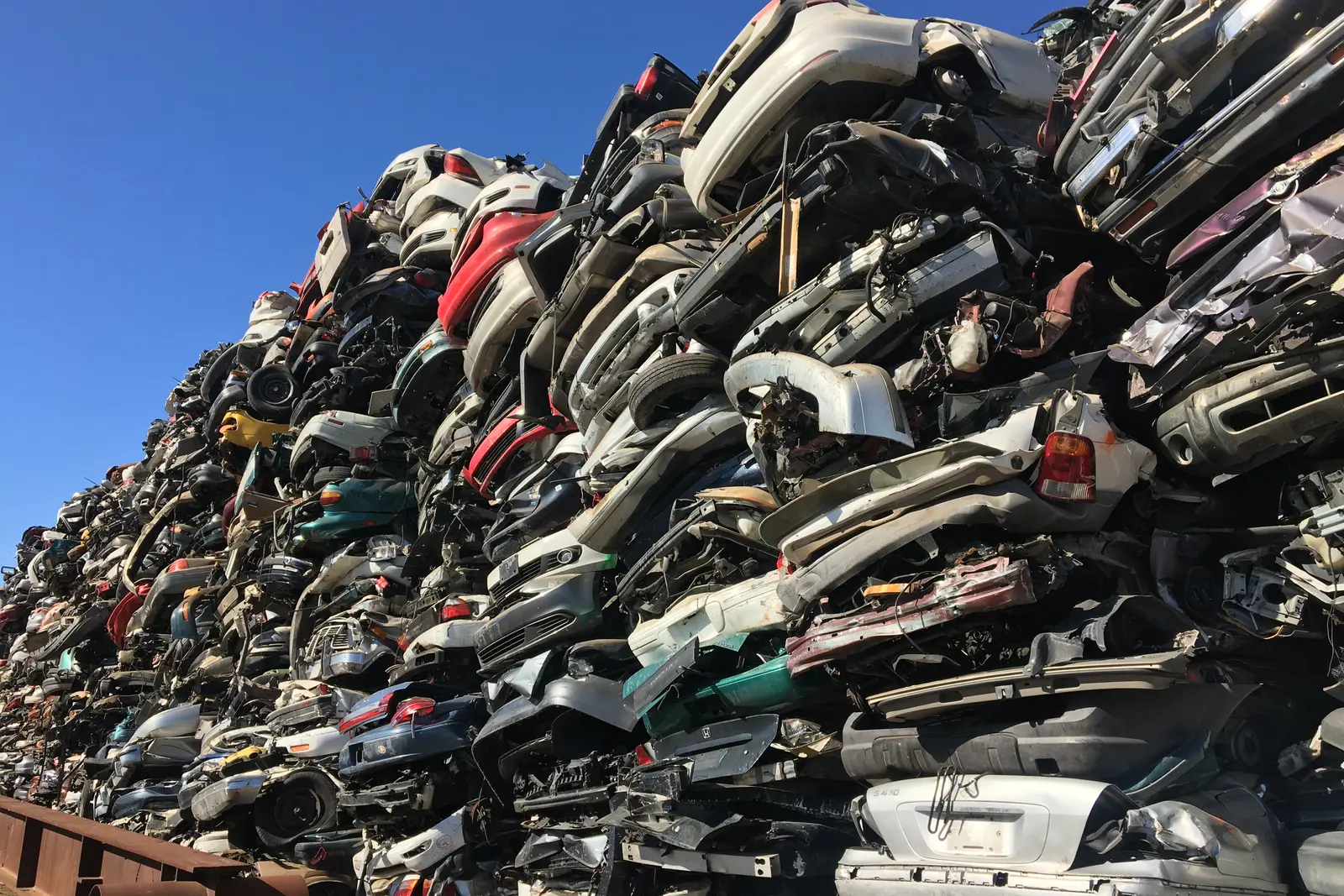 Scrap vehicle recycling Scrap vehicles processed at a metal recycling yard