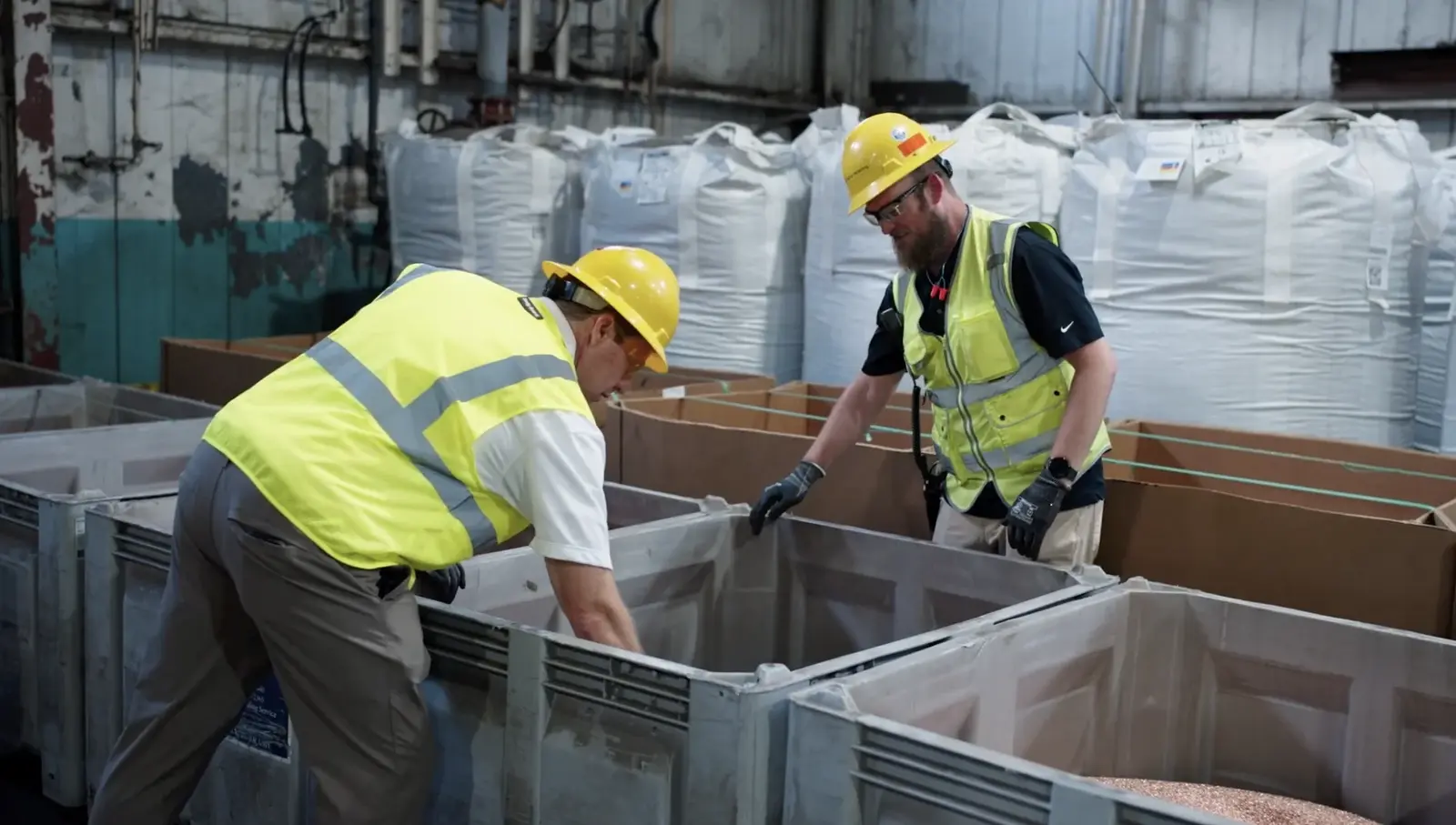 Radius Recycling professionals discussing safe and responsible operation