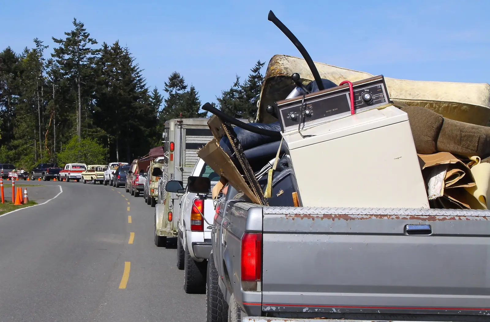 Pickup trucks dropping off household scrap metal