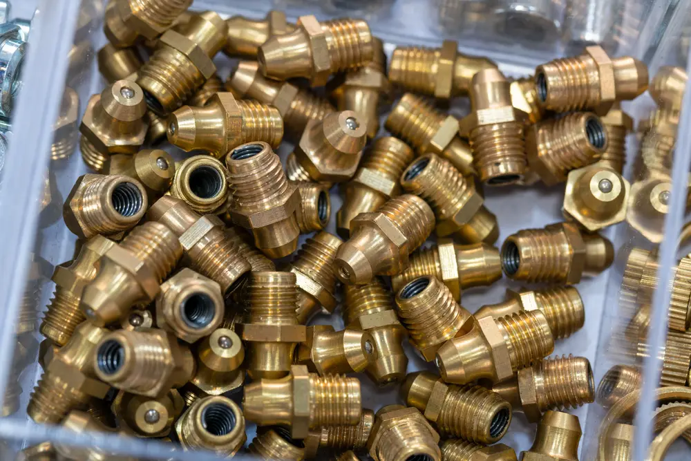Brass scrap metal fittings and valves collected for recycling