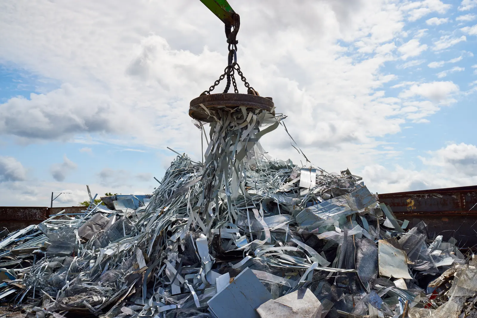 Magnet lifting scrap steel during scrap steel recycling and processing