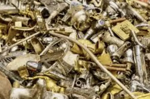 Mixed nonferrous metal scrap including brass and copper pieces